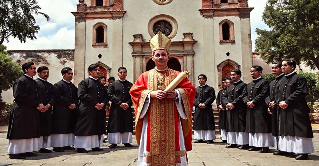 A solemn Catholic bishop in traditional regalia stands before St. Joseph's Church in Tlaxcala, Mexico, surrounded by seminarians in cassocks, reflecting the establishment of the new Diocese of Tlaxcala in 1959.