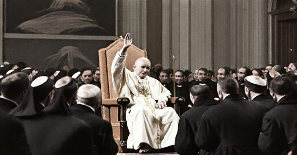 John XXIII addressing Jesuits in Rome (1961), symbolizing the betrayal of Catholic doctrine through misplaced obedience.