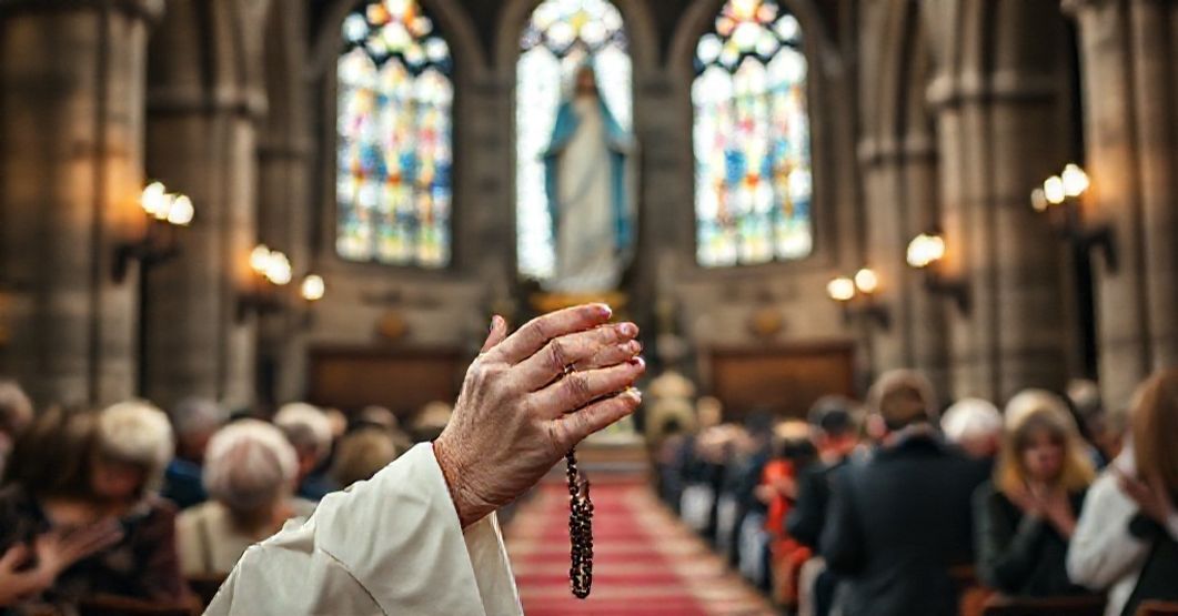A priest leading prayers in a historic church with faithful kneeling in devotion, emphasizing Marian piety and reverence during the month of May.